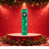 Linterna Olight Odin Mini con tema navideño en un podio con adornos festivos